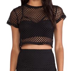 Crop Top By Donna Mizani. Brand New With Tags. True To Size. 93% Rayon 7% Spandex. Not From Nasty Gal, Brand Is Donna Mizani. Tags: Revolve / Nasty Gal Casual Mesh Crop Top For Party, Fitted Casual Crop Top With Hollow Out Details, Fitted Mesh Beach Top, Fitted Mesh Top For Beach, Summer Club Mesh Crop Top, Black Stretch Tops With Hollow Out Details, Stretch Black Tops With Hollow Out Detail, Black Stretch Hollow Out Tops, Black Stretch Hollow-out Tops