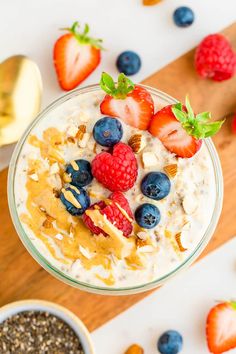 a bowl of oatmeal with fruit on top