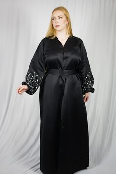 This abaya is sized based off of both height and fitting. Abaya Store, Luxury Abaya, Abaya Black, Black Balloon, Black Abaya, Black Balloons, Abaya Designs, Dresses For Sale, Timeless Design