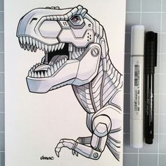 a drawing of a t - rex is shown next to a marker and some pens