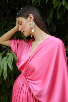 Colour : Bubble Gum PinkFabric : SatinDetails :Kimono sleeves, Fitted Waist, Side Zip & Hook for closure.Length : 59 inchesTHE MEASUREMENTS ARE IN INCHES Shoulder Bust Waist Low Waist Hips Armhole Extra Small 14 34 27 29 38 14 Small 14.5 36 29 31 40 15.5 Medium 15 38 31 33 42 16.5 Large 15.5 40 33 35 44 17.5 XL 16 42 35 37 46 18.5 XXL 17 44 37 39 48 19.5 Care• Dry Clean Only• Do Not Bleach• Steam Iron OnlyThis item is Made-To-Order. Please allow up to 21 working days for us to make your bespoke Silk V-neck Kimono For Daywear, Pink V-neck Kaftan For Evening, Elegant Pink V-neck Kimono, Elegant V-neck Kimono For Spring, Elegant Pink V-neck Kaftan, Chic Silk V-neck Kaftan, Pink Floor-length Dress With Draped Sleeves, Pink Floor-length Dresses With Draped Sleeves, Spring V-neck Dress With Draped Sleeves