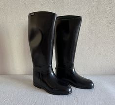 Aigle Rubber Boots Black Waterproof Boots Made in France Equestrian Boots Riding Boots by Aigle High Rubber Boots Size 39 Stamped size: EUR 39 Heel to toe (outside): 10 1/4"/ 26 cm Ball: 3 3/4"/ 9.5 cm Height: 17 1/4"/ 44 cm  Top opening: 15 3/4"/ 40 cm  Condition: Great Vintage Condition Made in France N.B. Color may slightly differ from picture SHIPPING * Items are shipped 1 - 3 business days after receiving the payment. * I ship from Europe, so please allow 2 to 3 weeks for the package to arr Aigle Boots, Equestrian Boots, Rubber Boots, Waterproof Boots, Boots Black, 3 Weeks, Riding Boots, Made In France, Equestrian