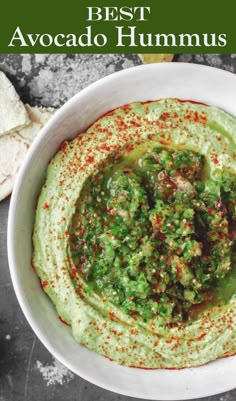 the best avocado hummus recipe in a white bowl