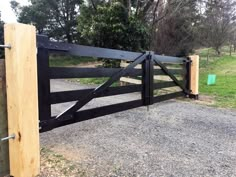 Black timber gate Corrugated Metal Gate, Bamboo Gate, Pebble Pathway, Farm Fence Gate, Farmhouse Gate, Driveway Gate Diy, Front Gate Ideas, Farm Gates Entrance, Wood Gates Driveway