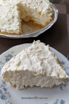 a piece of cake sitting on top of a white plate next to a pie pan