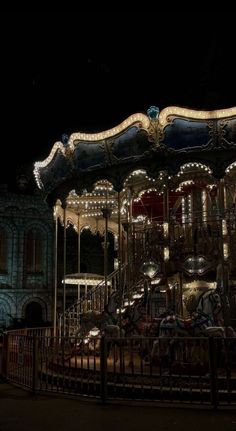 a merry go round in the dark at night