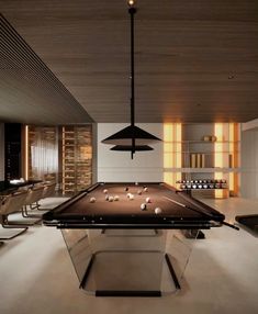 a pool table in the middle of a room