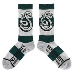 Show your cunning side with these Harry Potter athletic crew socks. These socks come in gray with green stripes to represent the Hogwarts House of Slytherin. The gray snake mascot appears on the cuffs of the socks while blakc letters along the arch spell out, "Slytherin." Bring some school pride to your style with these Harry Potter socks. Harry Potter Socks, Harry Potter Slytherin, Rugby Stripe, Slytherin House, Linoleum Flooring, Harry Potter Books, School Pride, Hogwarts Houses, Socks For Men