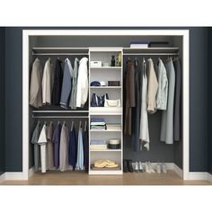 an open closet with clothes and shoes hanging on the shelves, in front of a blue wall