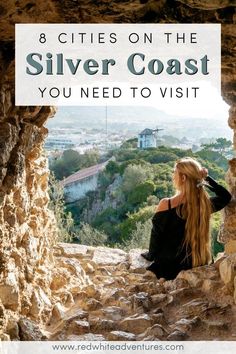 a woman sitting on top of a cliff looking out at the valley below and text overlay that reads 8 cities on the silver coast you need to visit