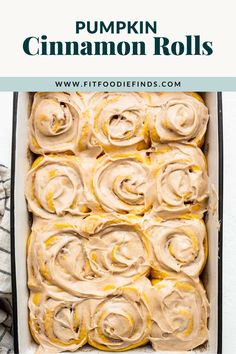 pumpkin cinnamon rolls in a pan with frosting on top and the title above it