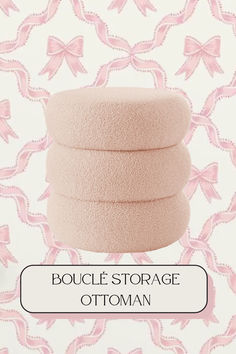 three pink sponges stacked on top of each other in front of a wallpaper