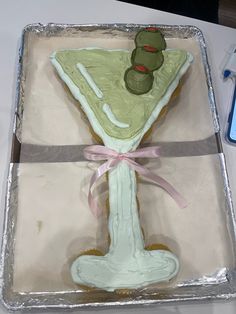 a decorated cake in the shape of a vase