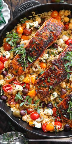 Mediterranean Salmon & Rice with Chickpeas, Cherry Tomatoes, Olives, Lemon, Oregano, and Feta Cheese - in a cast iron skillet. Mediterranean Salmon, Fish Dinner Recipes, Salmon And Rice, Salmon Dinner, Salmon Dishes