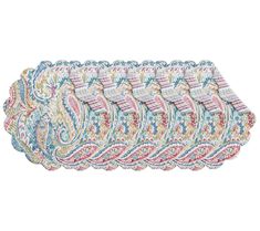 six placemats with paisley designs on the sides and one is blue, pink, green