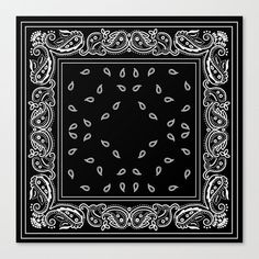 a black and white bandanna with paisley designs