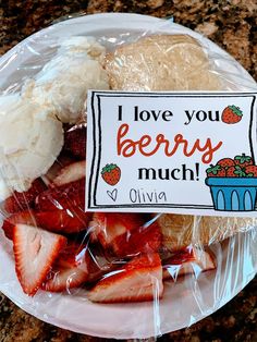 a plate with strawberries, bananas and ice cream on it that says i love you berry much