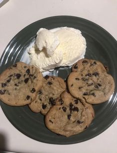 chocolate chip cookies and ice cream on a plate