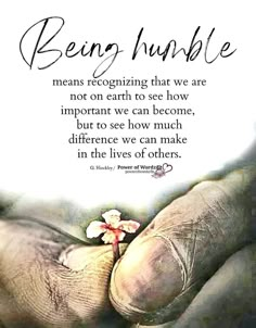 two hands holding each other with the words being humble