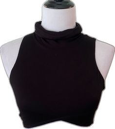 Black Halter Neck Top With Built-in Bra, Black Tank Crop Top With Built-in Bra, Chic Black High Neck Halter Top, Chic Stretch Sleeveless Crop Top, Black High Neck Tank Top For Spring, Spring Black High Neck Tank Top, Solid Color Fitted Sleeveless Top, Black High Neck Tank Top For Night Out, Black Stretch High Neck Crop Top