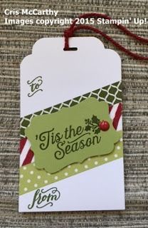 a tag that says tis the season on it