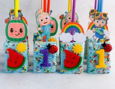 birthday candles with cartoon characters on them