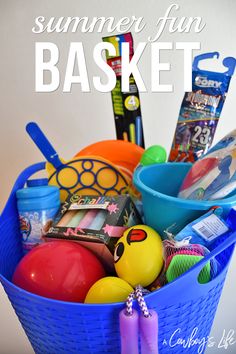 a blue basket filled with toys and other items