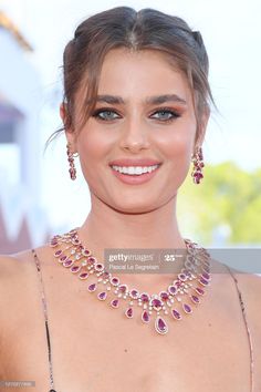 the actress wearing an elaborate necklace and earrings at the venice film festival on may 22, 2013