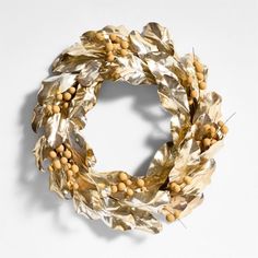 a wreath made out of leaves and nuts