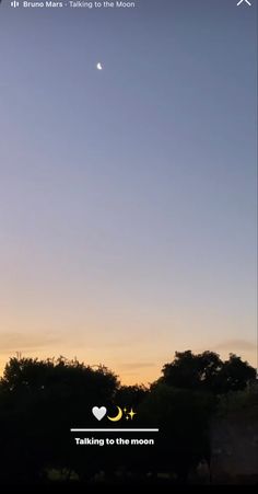 the moon is setting in the sky with trees and buildings behind it, as seen from an iphone screen