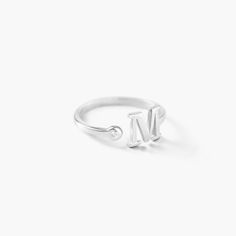 Tiny Initial Ring, Silver | Oak & Luna Adjustable Initials Stackable Rings For Everyday, Everyday Adjustable Stackable Rings With Initials, Everyday Open Ring With Initials, Everyday Initial Open Ring, Everyday Open Initial Ring, Everyday Engraved Initials Open Ring, Classic Adjustable Stackable Rings With Initials, Sterling Silver Stackable Initial Ring Open Design, Classic Adjustable Initial Open Ring