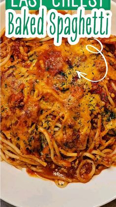 a white plate topped with spaghetti covered in sauce and parmesan cheese next to a green sign that says easy cheesy baked spaghetti