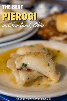 the best piergi in cleveland, ohio is served on a plate with cheese sauce