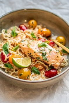 a close up of a bowl of food with noodles