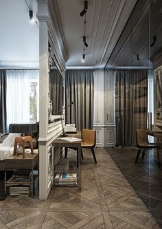 a bedroom with wooden floors and gray curtains