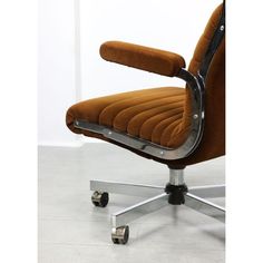 an office chair with wheels on the back and seat upholstered to the side