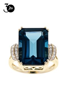 11.73ct emerald cut London blue topaz with .24ctw round white diamonds, 14k yellow gold ring. Measures approximately .73"L x .64"W. White rhodium. Yellow Gold Ring, London Blue Topaz, London Blue, Blue Rings, White Diamonds, Yellow Gold Rings, Emerald Cut, Diamond White, Blue Topaz