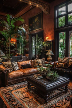 a living room filled with lots of furniture and plants