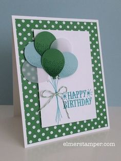 a birthday card with green balloons and white polka dots on the bottom, which reads happy birthday