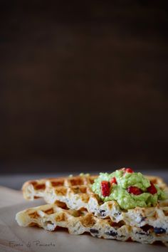 a waffle with guacamole on top