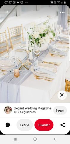 an iphone photo of a table set up for a wedding with gold and silver place settings