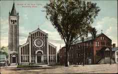 an old photo of a church with a clock tower