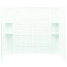 an empty white shower with shelves on the wall