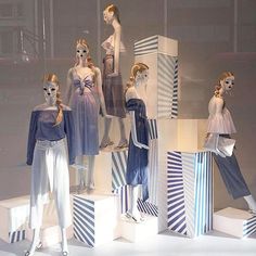 mannequins dressed in blue and white outfits