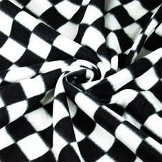 a black and white checkered fabric is shown