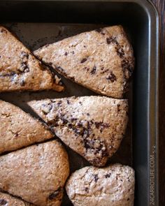 a pan filled with cookies on top of a wooden table