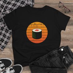 🧡Vintage Sushi Retro T-Shirt is a perfect gift idea if you need a present for your friend or family member who loves Sushi Rolls. Sushi lovers will freak out if you give them this Sushi T-Shirt as a gift. You've now found the staple t-shirt of your wardrobe. It's made of a thicker, heavier cotton, but it's still soft and comfy. And the double stitching on the neckline and sleeves add more durability to what is sure to be a favorite! * 100% ringspun cotton * 4.5 oz/y² (153 g/m²) * Pre-shrunk * S Retro Short Sleeve T-shirt For Gifts, Retro Short Sleeve T-shirt As Gift, Retro Short Sleeve T-shirt As A Gift, Retro Crew Neck T-shirt As Gift, Retro Funny Print T-shirt As Gift, Vintage Black Top Gift, Black Vintage Top Gift, Vintage Black Top As Gift, Gift Retro Black T-shirt