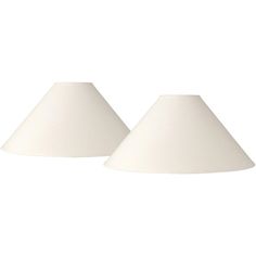 two white lamps are sitting next to each other