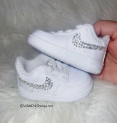 Swarovski Crystal Nike Air Force 1 Customized With Swarovski Diamond Crystals Baby Infant Bling Nike Crib Shoes  These are one of a kind beautiful custom made sneakers, embellished with authentic Swarovski Diamond elements, The most expensive Swarovski® crystals in the world, imported from Austria. Shoes are purchased from an authorize Nike retailer new in the box with tags. Hand customized by a certified Swarovski® artist. Shoes arrive beautifully packaged in original box. You will receive a on White Custom Sneakers With Bling, Round Toe, White Low-top Custom Sneakers With Bling, Baby Air Force Ones, Air Force One, Girls Shoes Sneakers, Baby Bling, Bling Shoes, Crib Shoes, Diamond Crystal