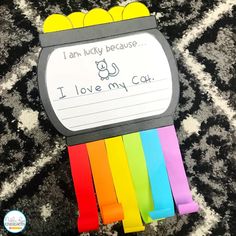 i am lucky because i love my cat craft made with colored paper and construction pencils